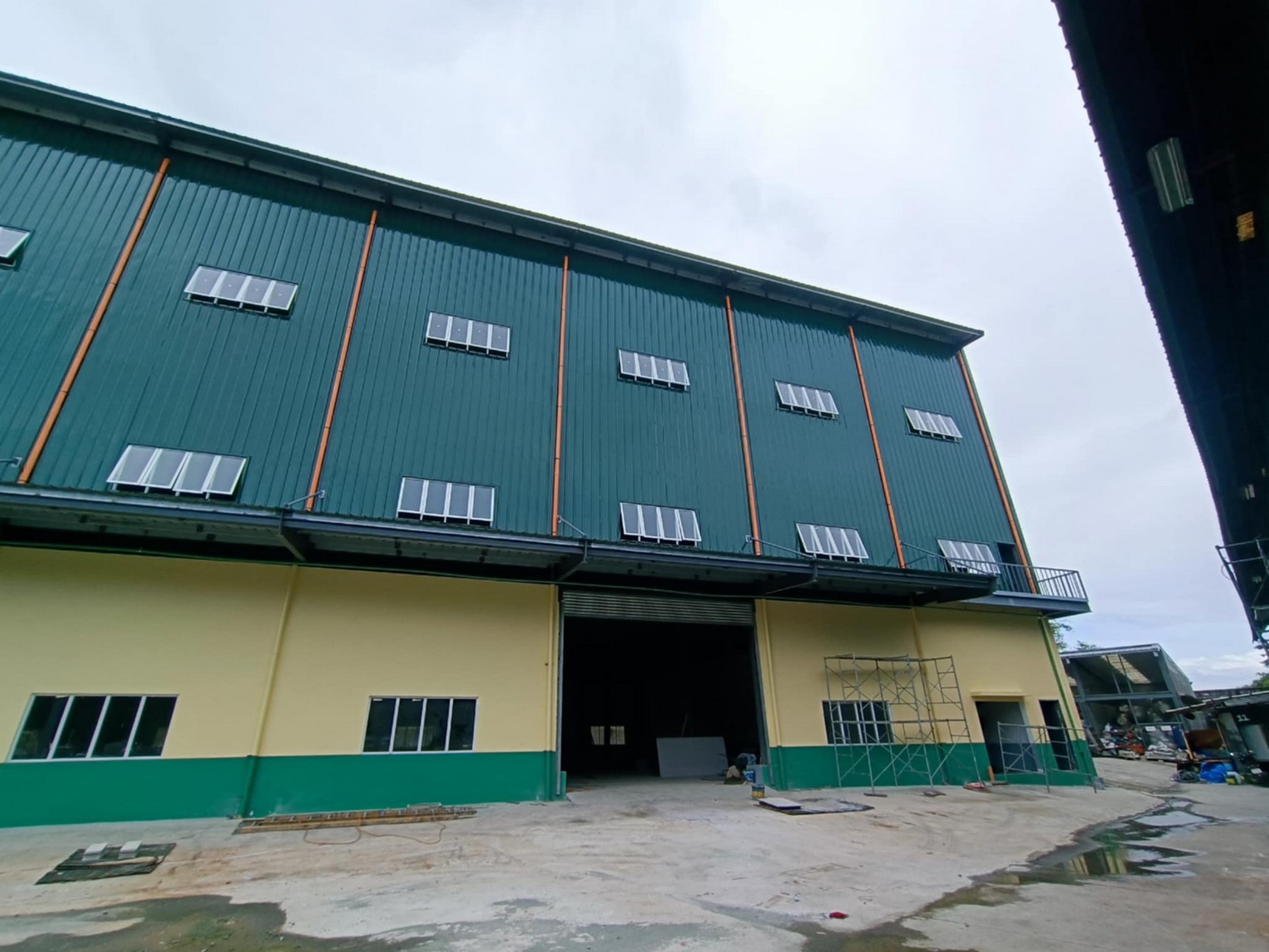 Completed 3-storey Best Tank warehouse building in Valenzuela City.