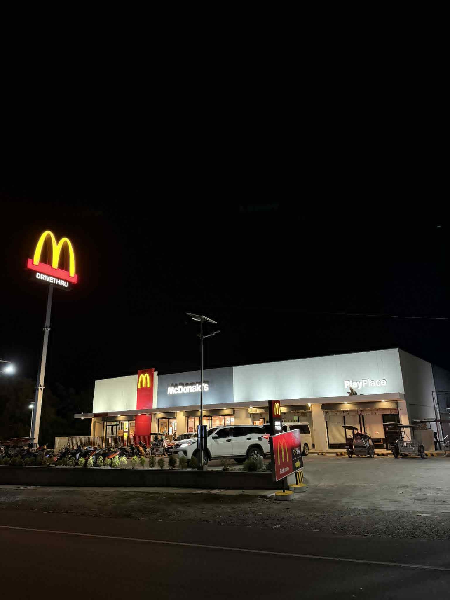 Completed McDonald's restaurant in Bolinao, Pangasinan at night.